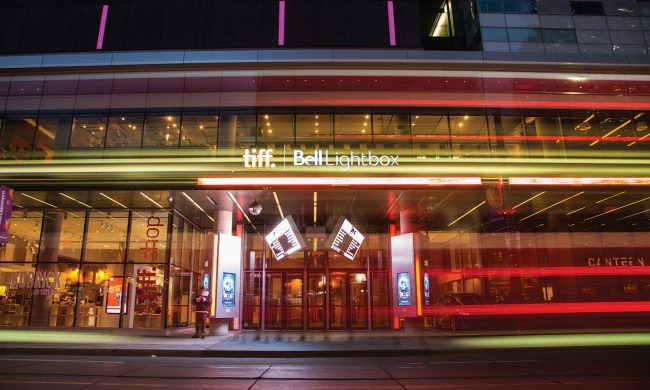 Photo of an outdoor film screening at a drive-in theatre at night in Toronto.